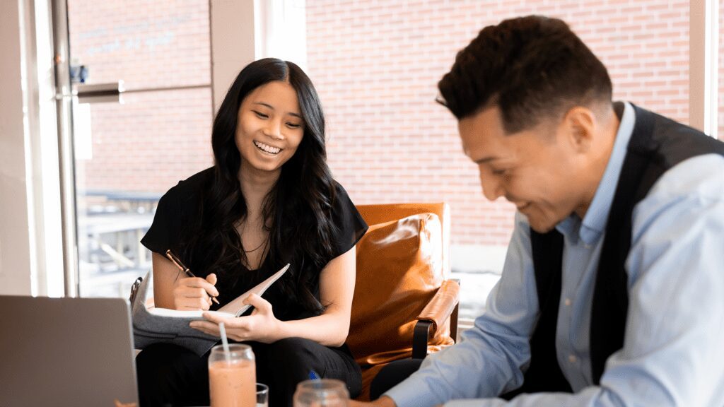 Students working together on a computer.