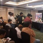 President Fike speaks with reporters at a press conference organized by University Hub in Hyderabad, India.