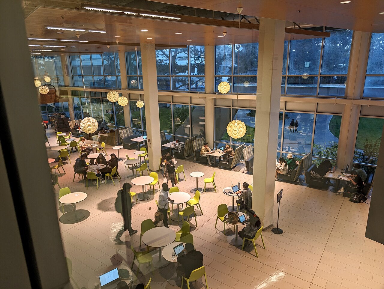 Students study and gather in the library at GGU's Parkmerced Campus.